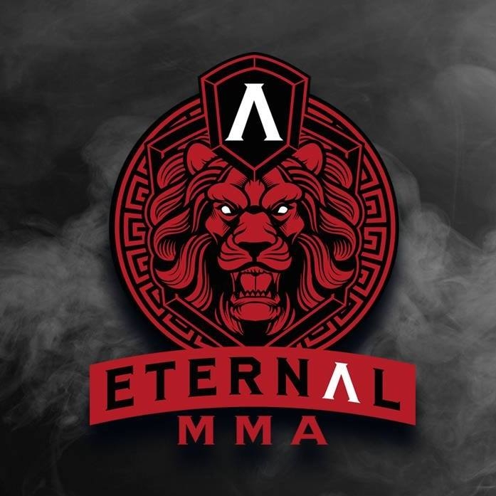 Graphic image of a lions head with the text: eternal MMA