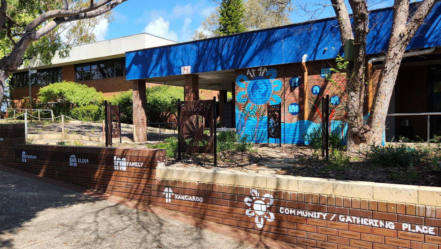 A Carine High School building with a mural by Noongar artist, Mariah Yarran.