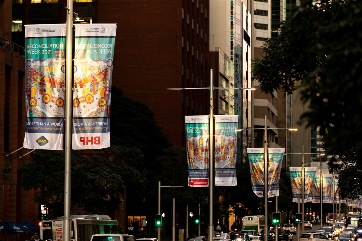 Reconciliation Week Street Banners on St George’s Terrace 2021. Artwork by  Tee Jay Worrigal.
