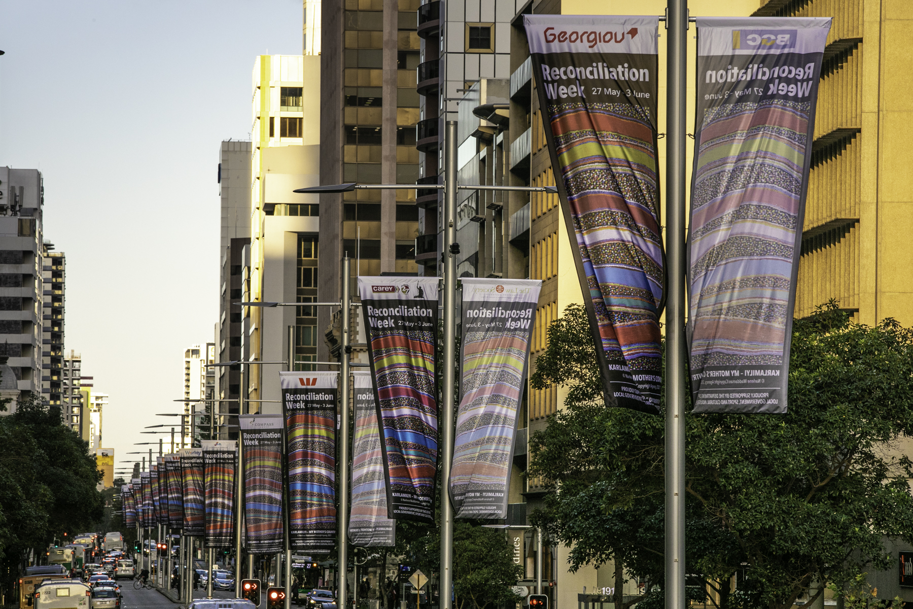 Reconciliation Week Street Banners on St George’s Terrace 2022. Artwork by  Narlene Waddaman