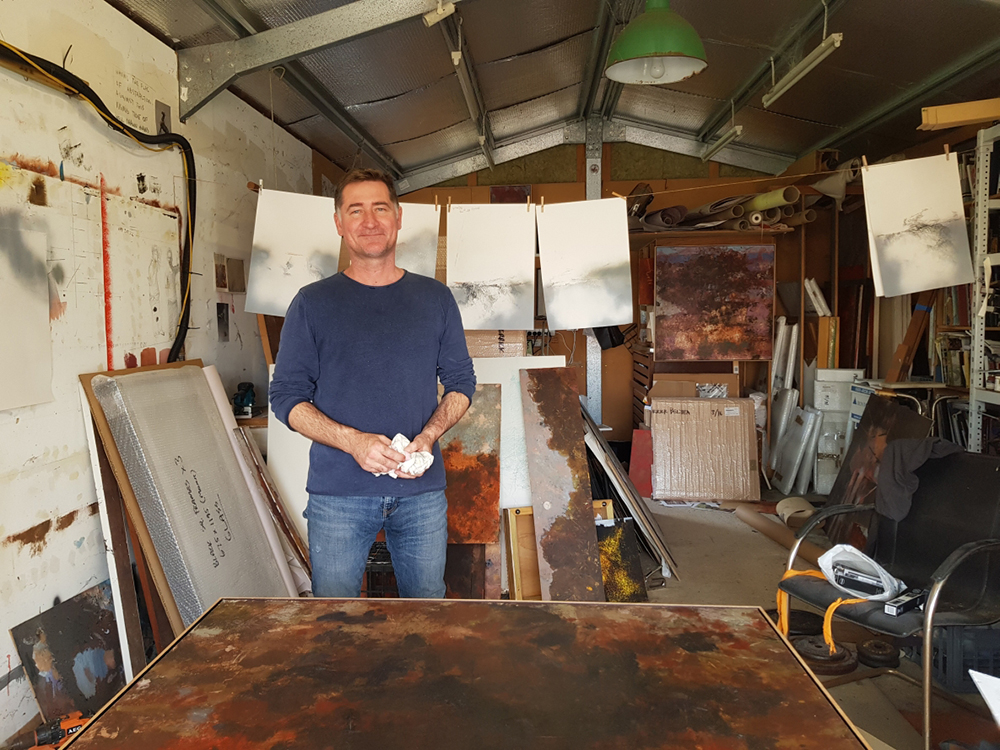 A photo of artist Merrick Belyea in his studio in Fremantle.