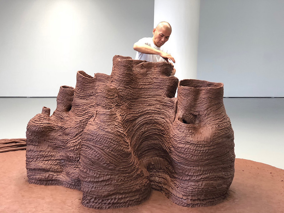 Jason Lim’s: Under the Shadow of the Banyan Tree, Jason Lim. Performance-Installation,ICA Singapore, 2018, 5 days durational performance.    Each day 6 hours non stop working with terracotta clay. Photograph: courtesy of the artist. 