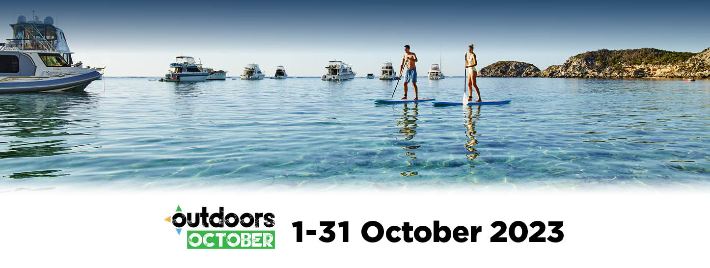 Two people on stand up paddleboards with the text, 'Get out and get active this October'
