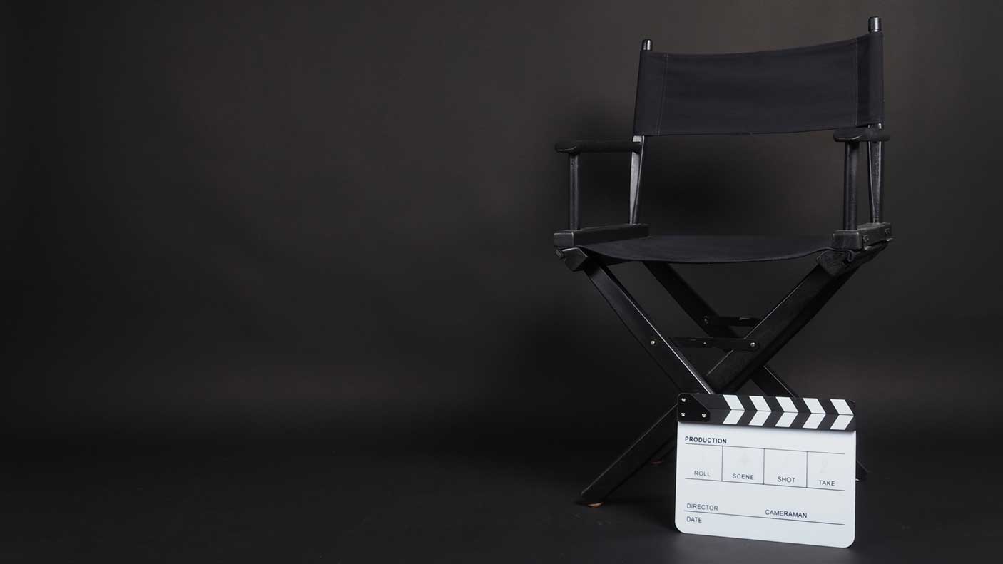 An empty directors chair and a clapper
