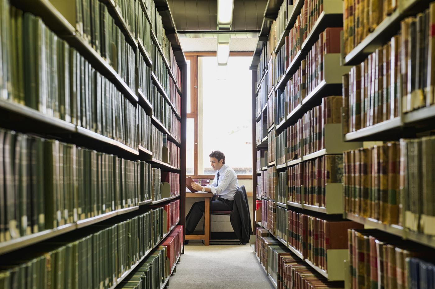Man sitting in a library