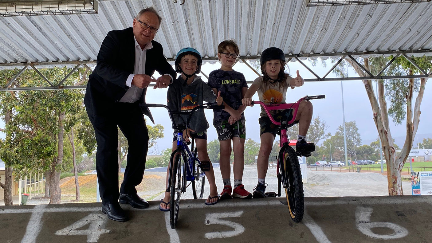 Minister Templeman with 3 BMX bike riders