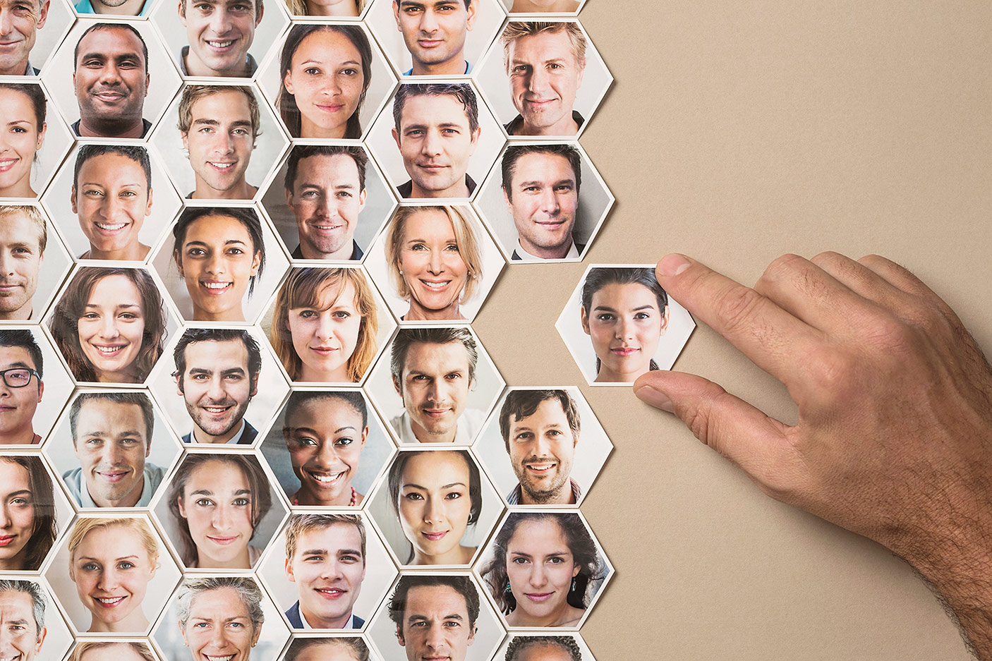 Montage of people's faces on hexagon tiles