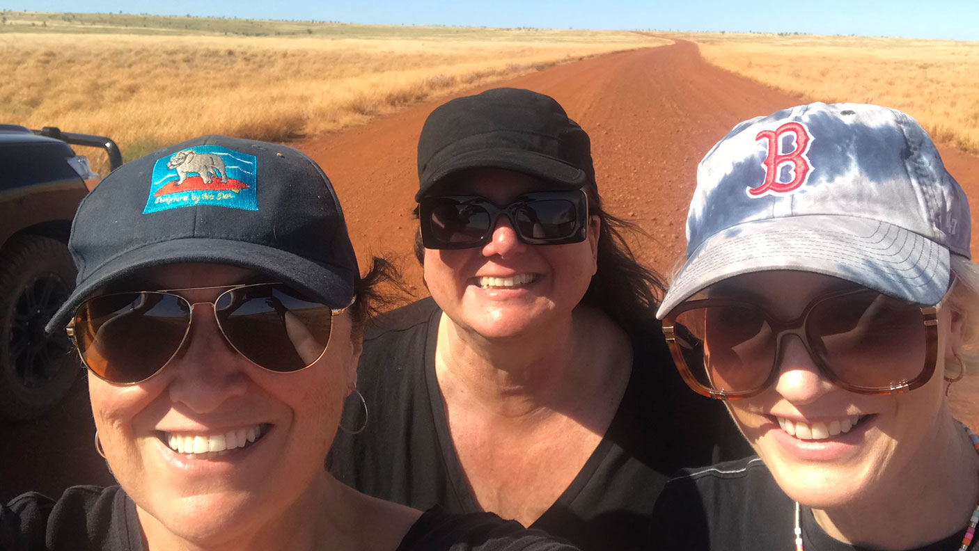 Close up selfie of Red Rock Run producer Miriam Stein; writer Meg Shields and director Cathy Randall with Pilbara landscape in the background