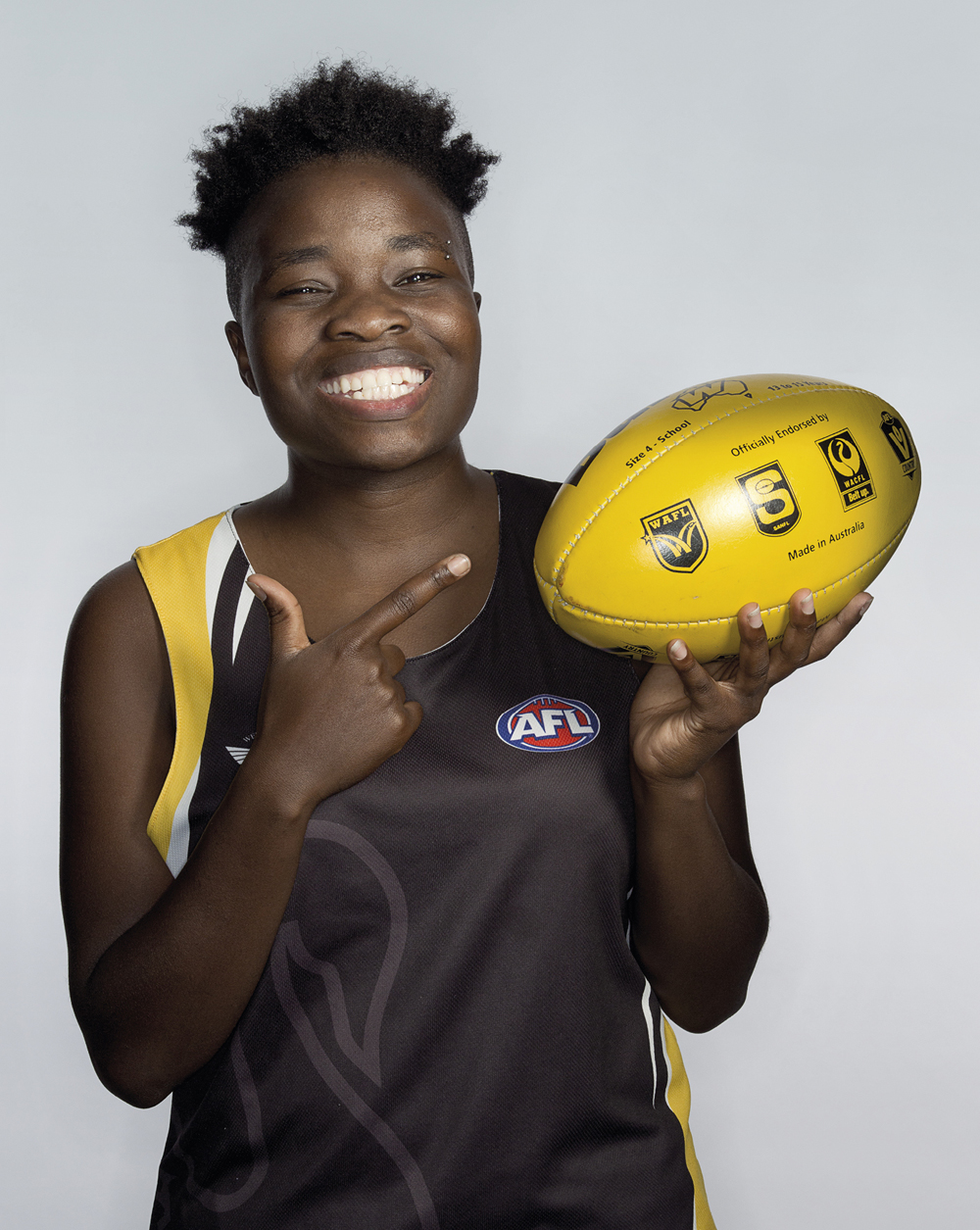 Portrait of Bella Ndayikeze with a football