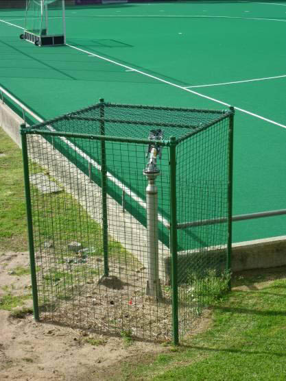 Figure 1: Water-based un-filled synthetic hockey pitch surface and irrigation point